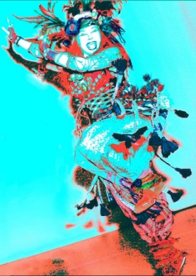 2nd Photo of Zehara in a jumping pose in her new tribal belly dance costume