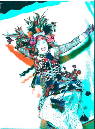 Photo of Zehara in a jumping pose in her new tribal belly dance costume